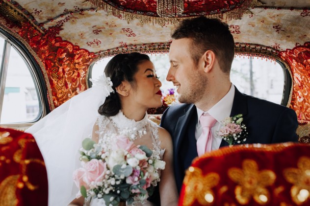 Indie Bride and Groom inside Kushi car