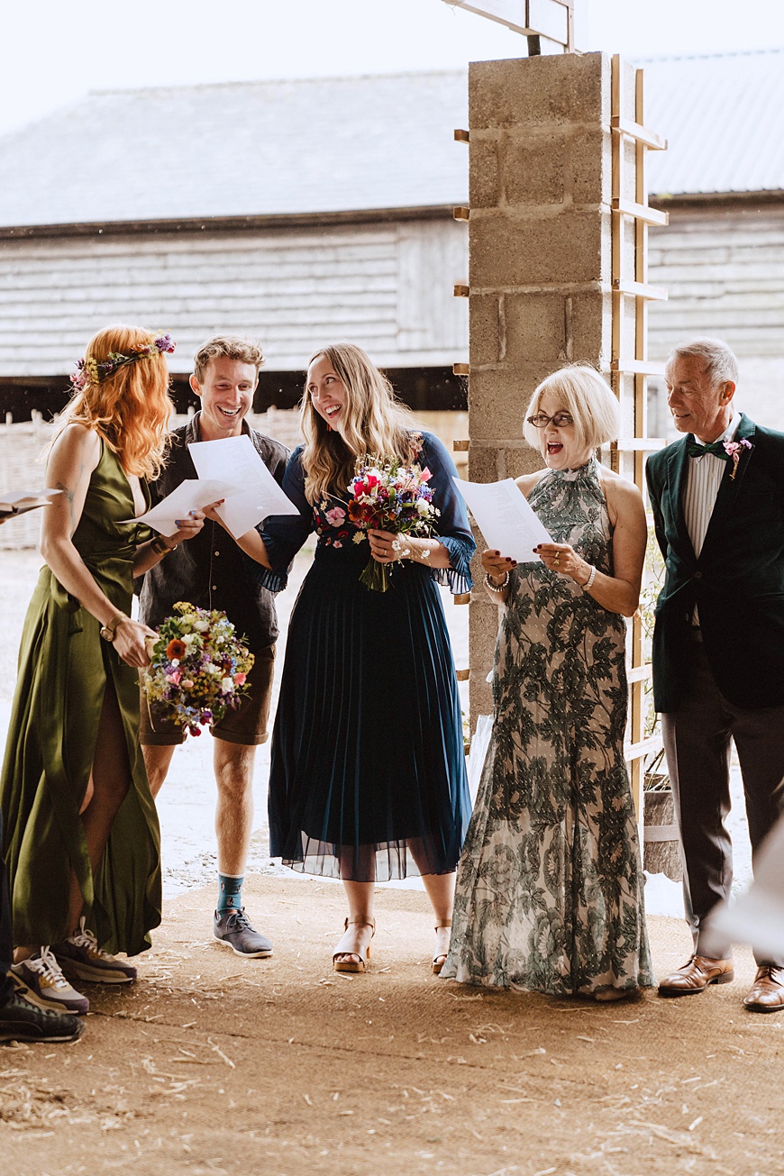 Bride and four wedding guests sing during Wilde Lodge ceremony