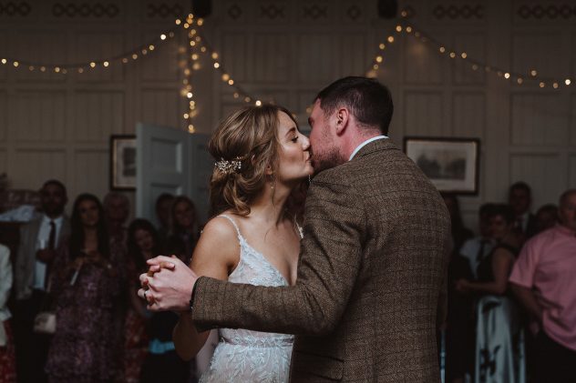 Bride and groom sharing a kiss on the dancefloor at Homme House, a Herefordshire wedding venue