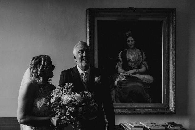 Father of the bride smiles whilst waiting for wedding ceremony at Iscoyd Parl