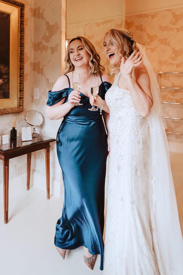 Bride and maid of honour getting ready at Iscoyd Park