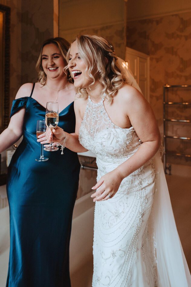 Bride and maid of honour getting ready at Iscoyd Park