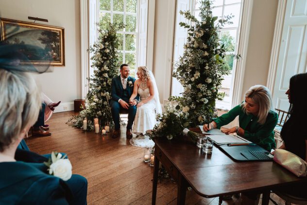 Bride and Groom sitting in Drawing Room at Iscoyd Park