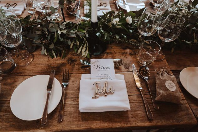 White and green wedding table setting in the Coach House at Iscoyd Park
