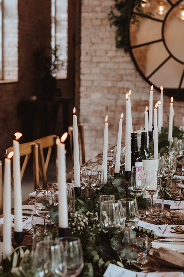 White and green wedding table arrangement in the Coach House at Iscoyd Park