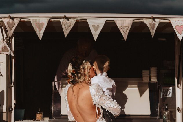 Bride and son waiting for ice cream at Pollys Palour Vintage Ice Cream Van