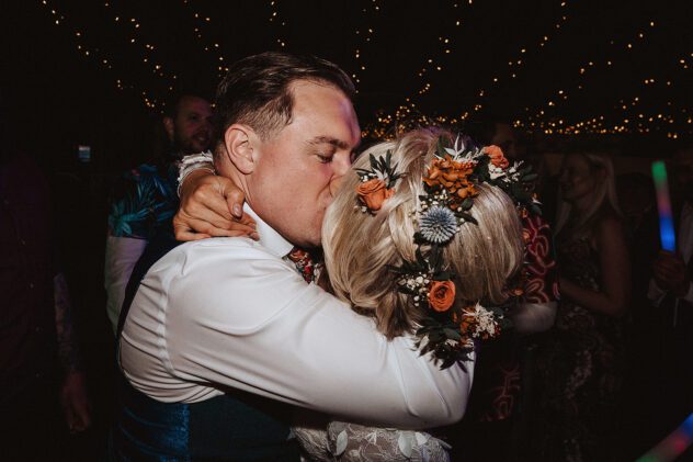 Bride and Groom kiss on the dancefloor of Stanford Farm wedding