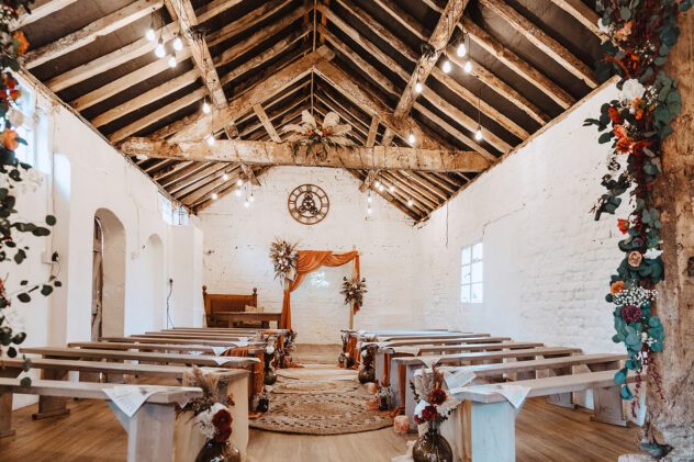 The ceremony room at Stanford Farm decorated in a boho style