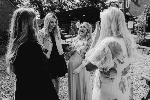 Guests laughing at Stanford Farm Wedding