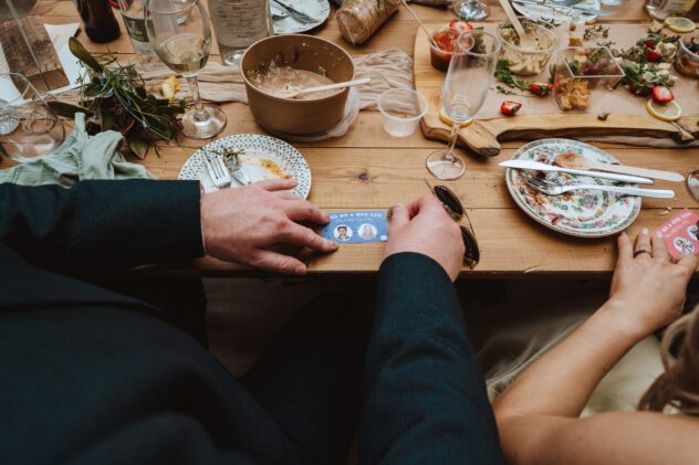 Wedding guests scratching off personalised wedding scratch cards