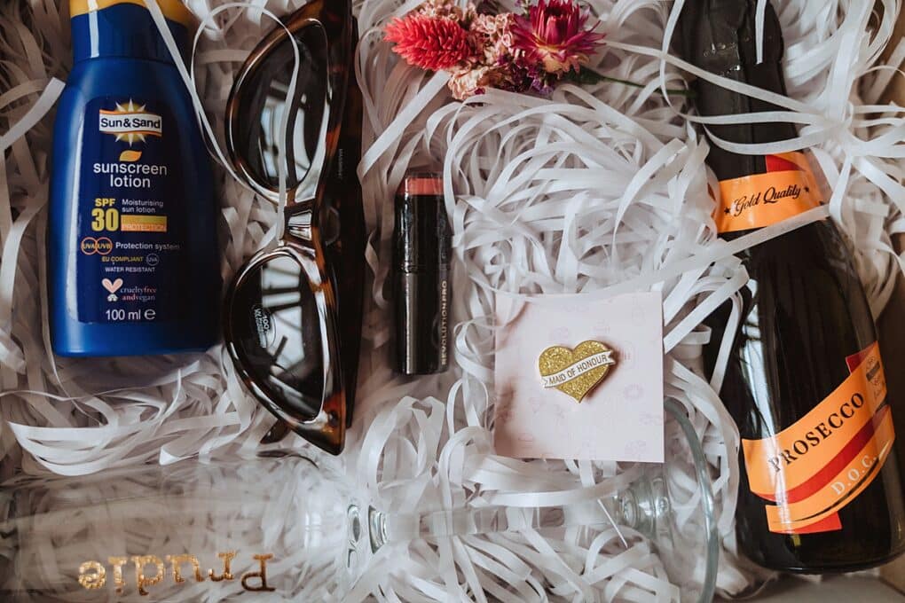 Bridesmaid gift box with sunglasses, prosecco, pin and lipstick