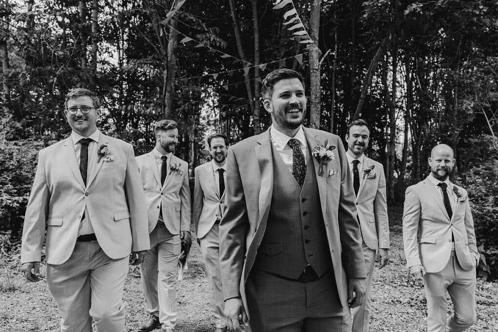 Candid Shropshire wedding photography of the groom and groomsmen
