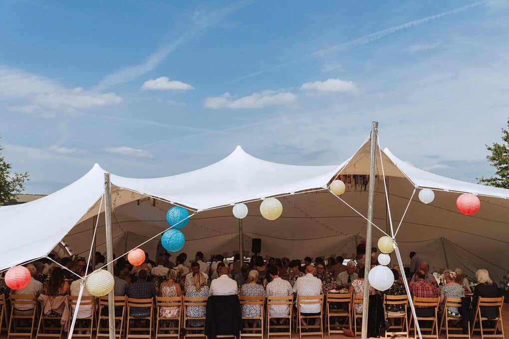 Candid Shropshire wedding photography of wedding tent