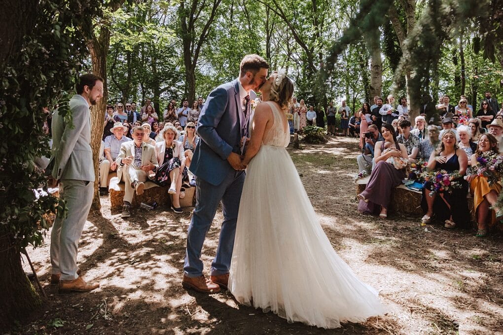 Candid Shropshire wedding photography of first kiss