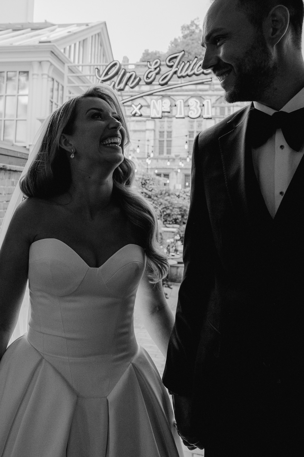 Authentic wedding storytelling in Shropshire featuring an unposed, quiet moment between a bride and groom during a relaxed stroll
