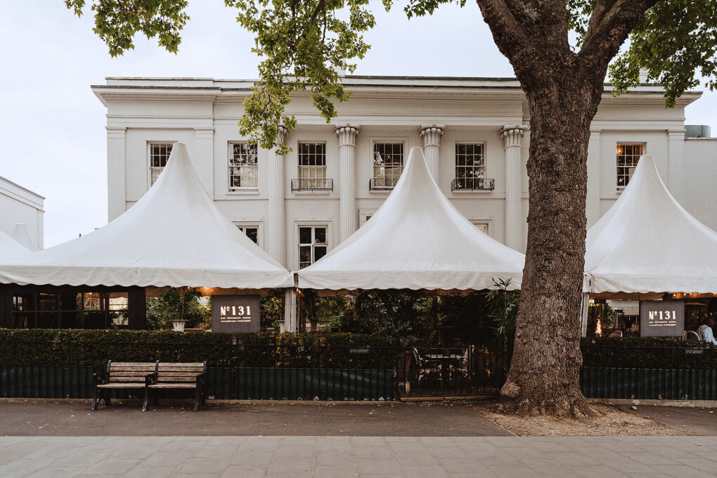 Exterior of No. 131 The Promenade Cheltenham during an intimate black tie wedding captured by Indie Love