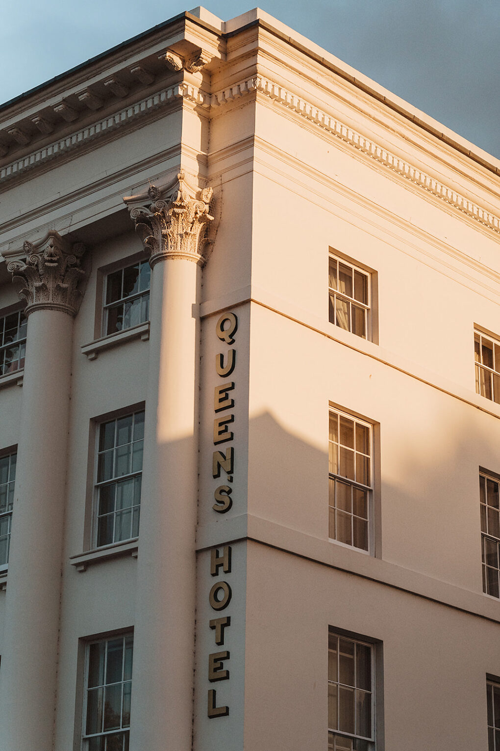 Exterior of The Queens Hotel Cheltenham during an intimate black tie wedding at No 131 The Promenade captured by Charlotte Preece of Indie Love