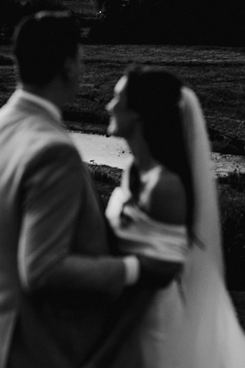 Quiet, unscripted moment between a bride and groom during their intimate wedding at Wilde Lodge, captured in a natural, documentary photography style.