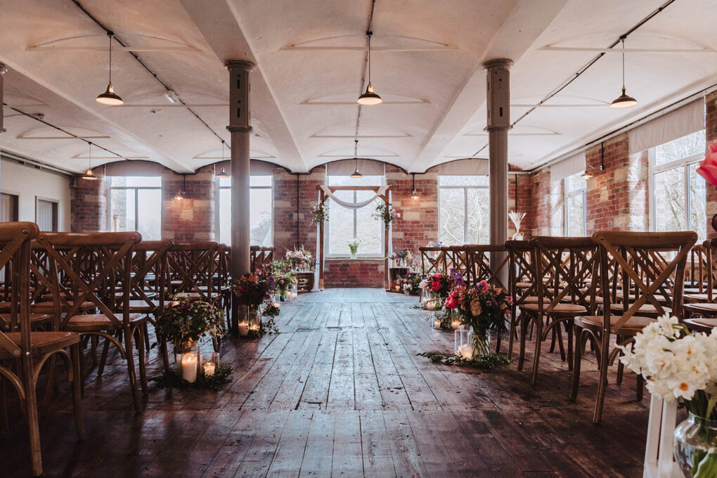 industrial warehouse setting for a non-traditional spring wedding ceremony
