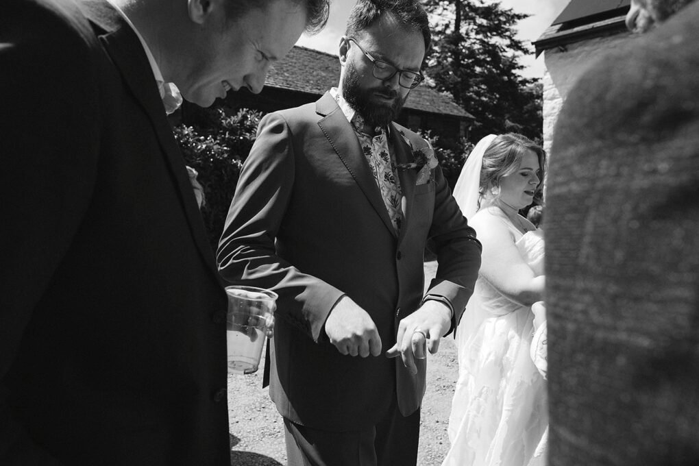 Candid photo of wedding guests at Glyngynwydd Wedding Barn
