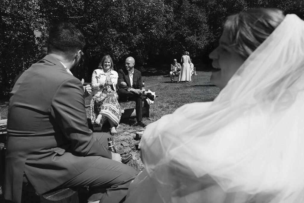 Real wedding reception moments inside the rustic barn setup at Glyngynwydd Wedding Barn.