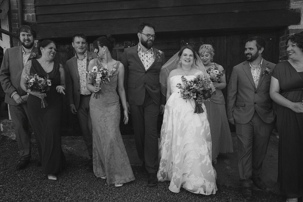Relaxed and informal photo of bridal party at Glyngynwydd Wedding Barns