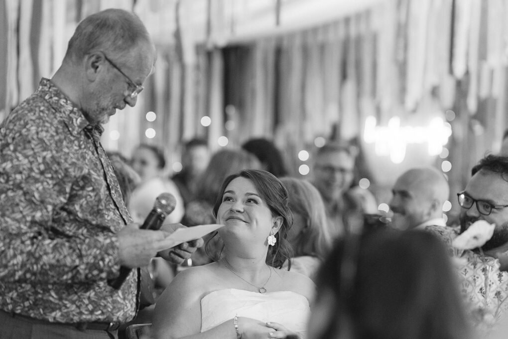 Candid photo of wedding guests at Glyngynwydd Wedding Barn